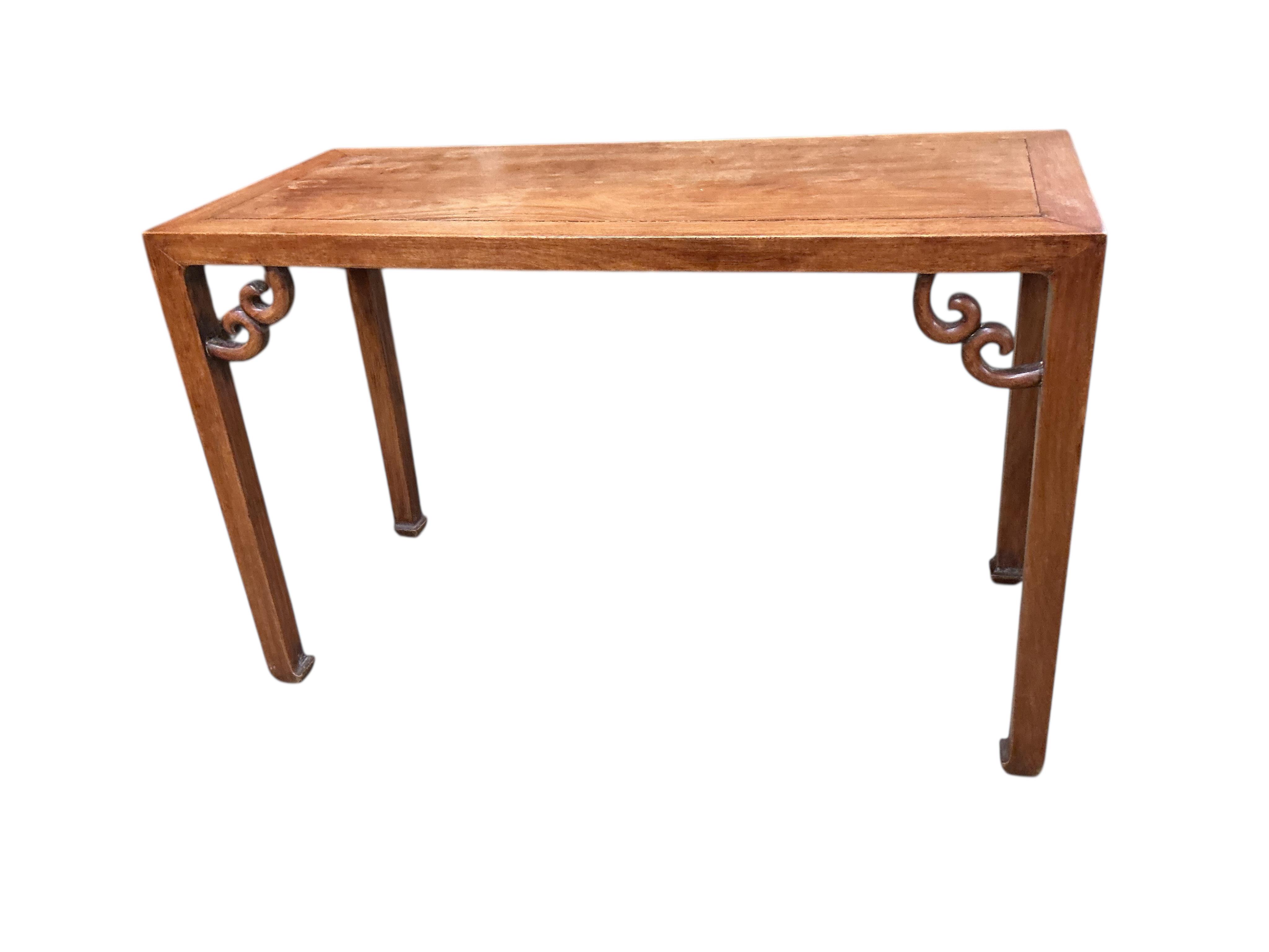 An early 20th century Chinese hardwood altar table, width 119cm, depth 51cm, height 77cm